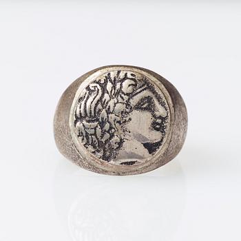 Signet ring, silver, man's profile, Mediterranean region.