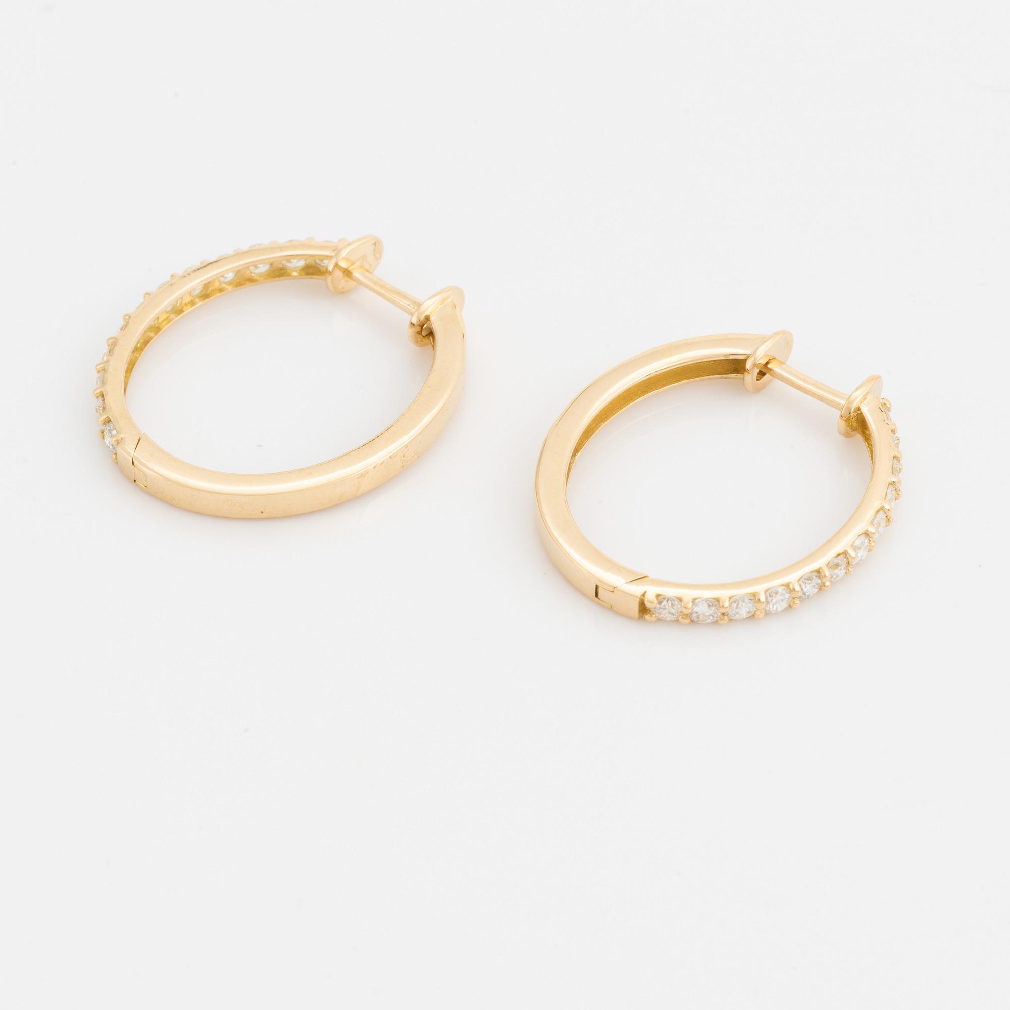 Brilliant cut diamond hoop earrings.