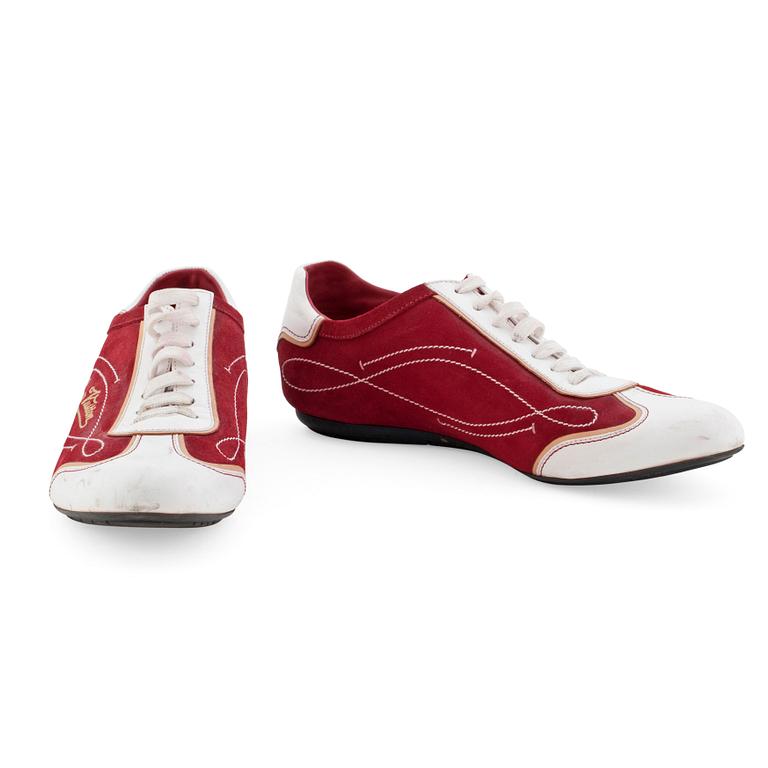 LOUIS VUITTON, a pair of white leather and red suede sneakers.