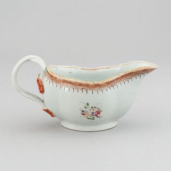 Two famille rose serving dishes and a sauce boat, Qing dynasty, Qianlong (1736-95).