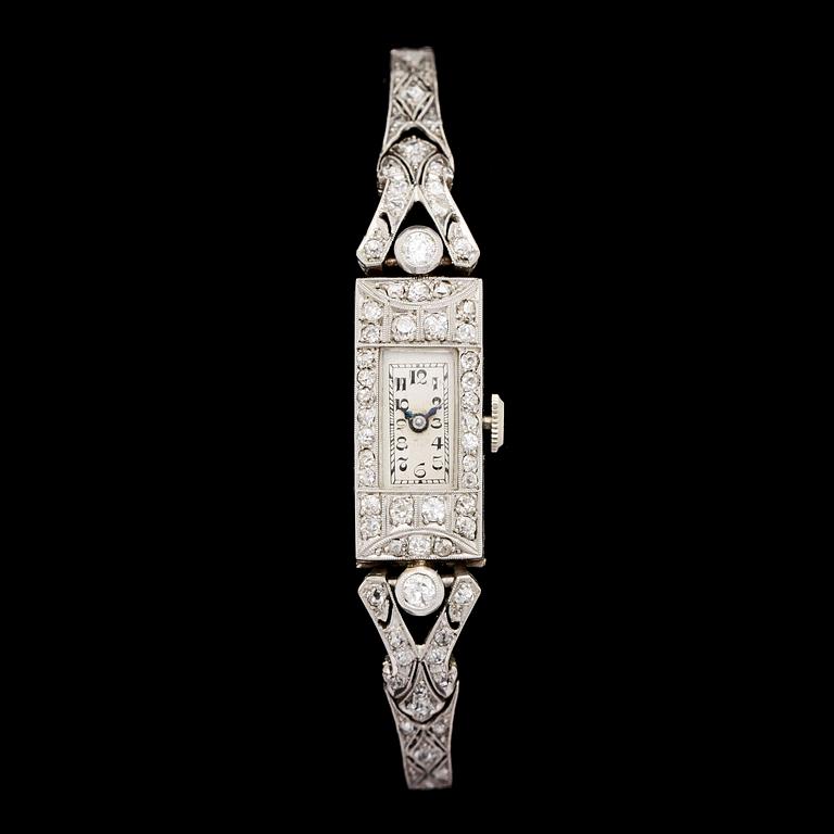 LADIE'S WRIST WATCH, brilliant- and eight cut diamonds, tot. app. 1.20 cts, c. 1920.