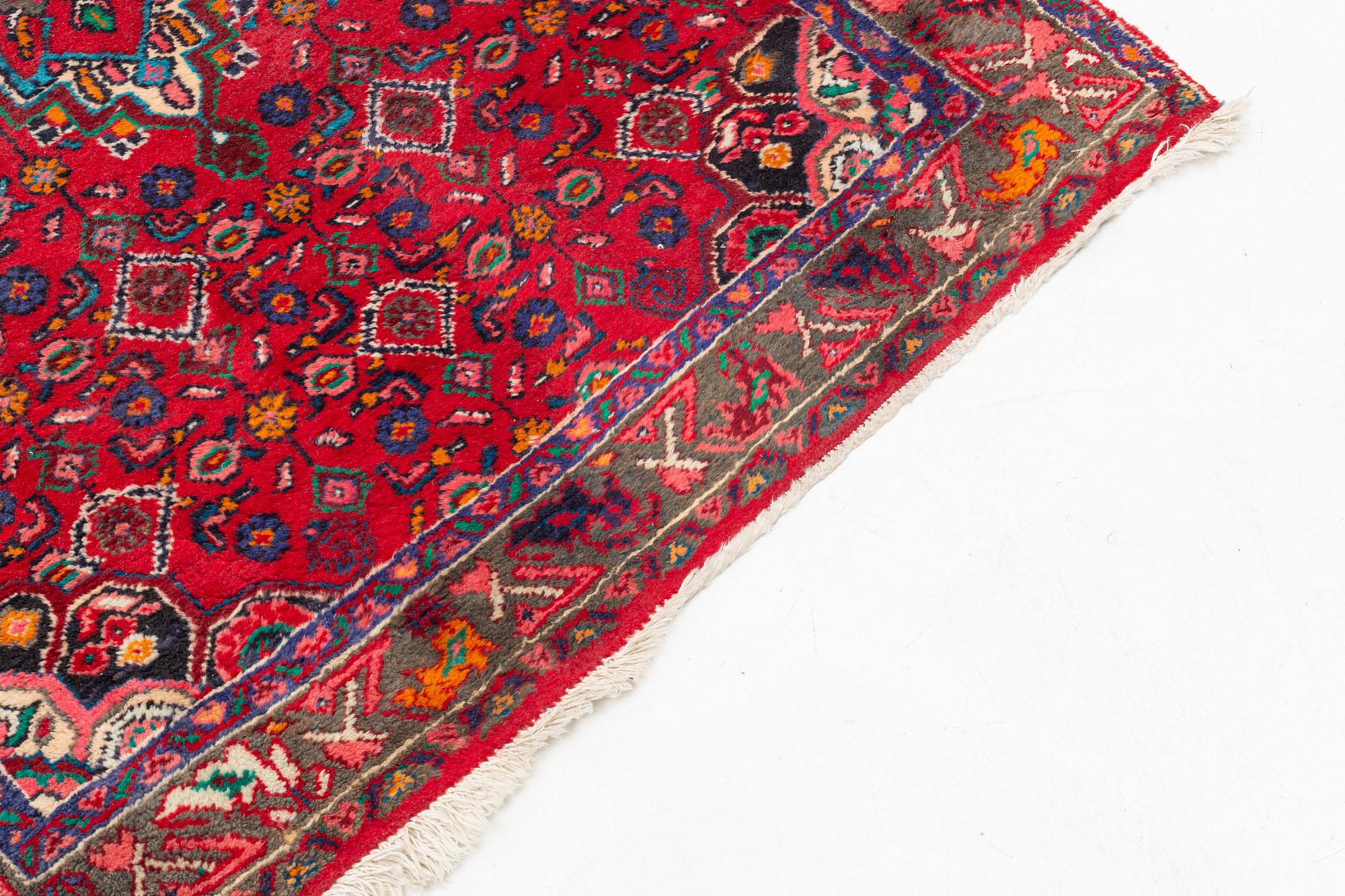 Rug, Hosseinabad, circa 310 x 112 cm.