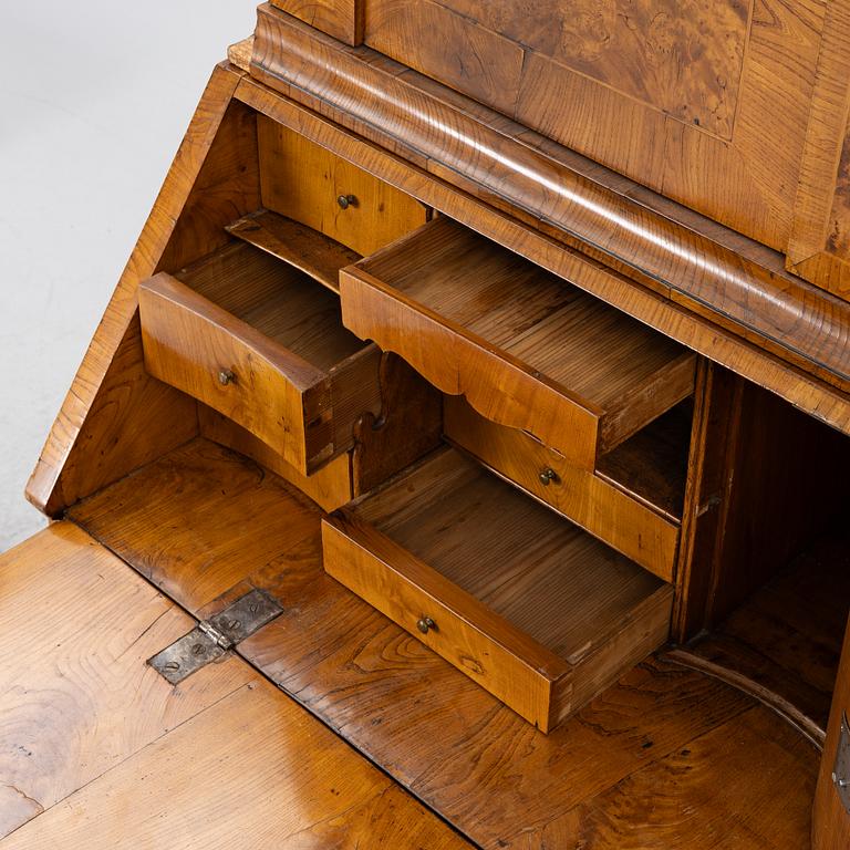 A Swedish rococo burr-alder veneered cabinet, later part 18th century.