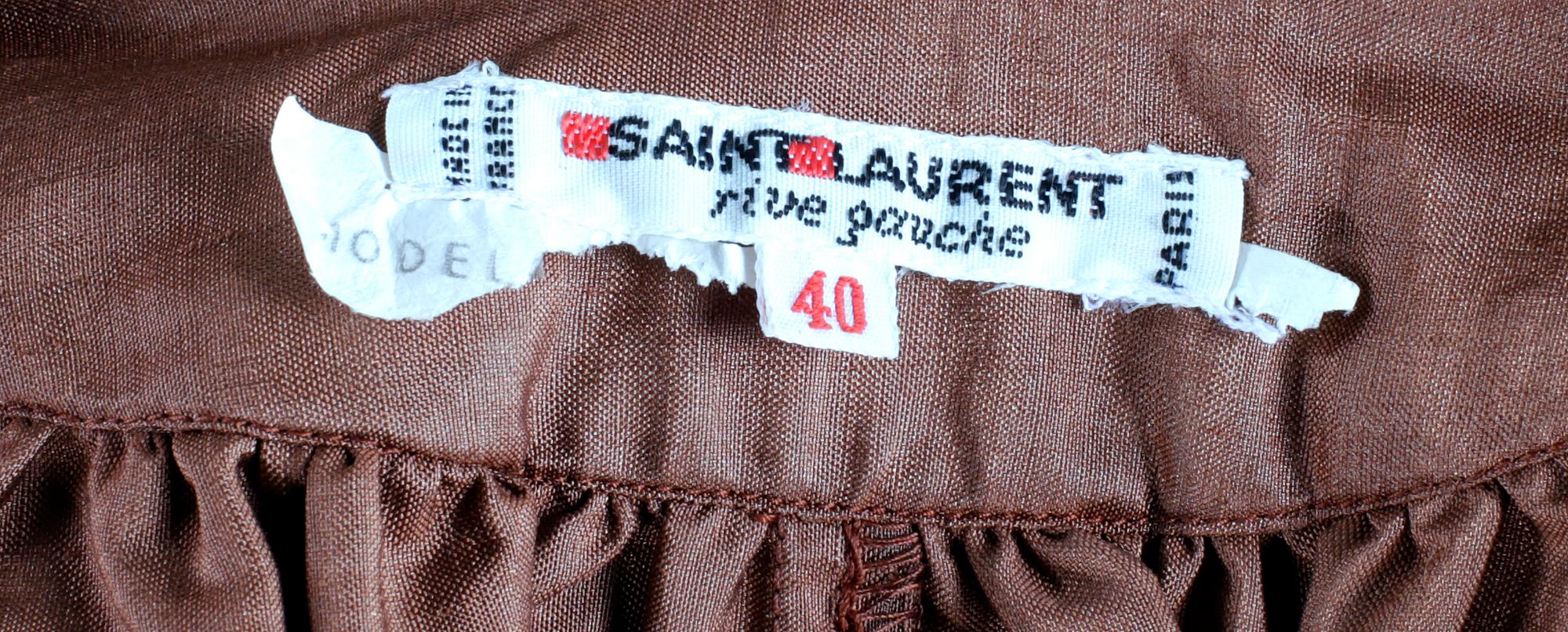 A set of two blouses by Yves Saint Laurent.