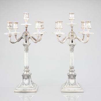 A pair of Swedish silver candelabras, mark of Svea Svensson, Stockholm 1908.