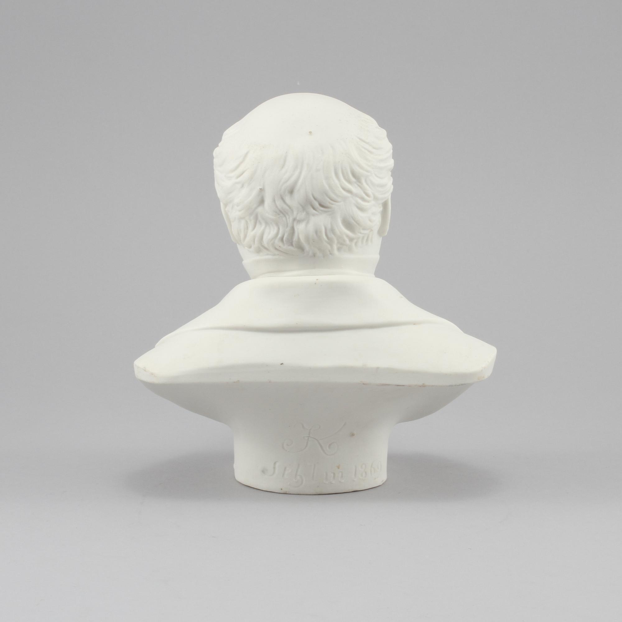 FIGURIN, parian, daterad 1869.