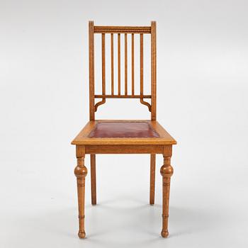 A set of 12 oak chairs, first part of the 20th century.