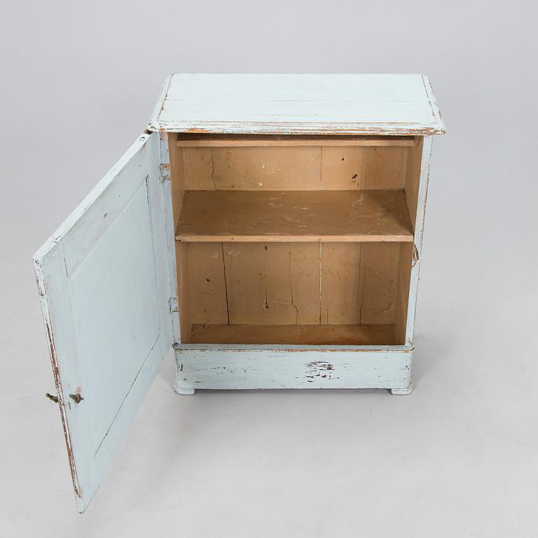 A painted cabinet, circa 1900.
