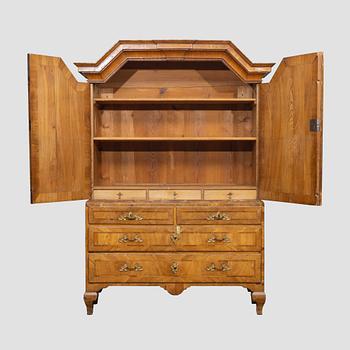 An oak veneered cabinet, mid 18th Century.