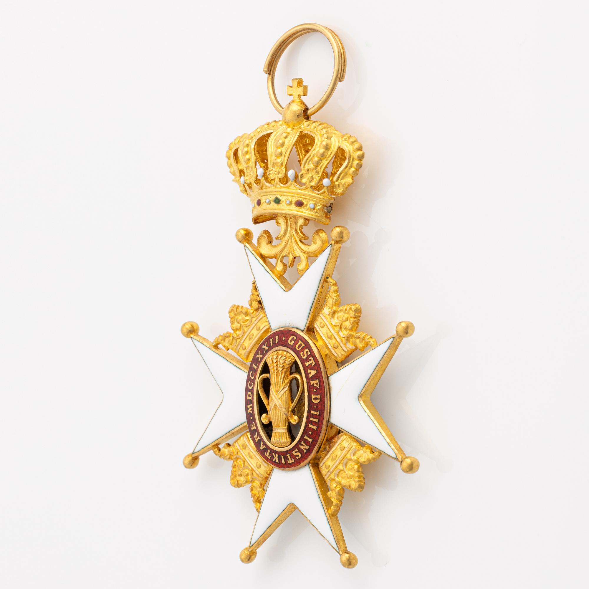 Vasaorden, riddartecken,  18K guld och emalj, C.F. Carlman, Stockholm 1945.