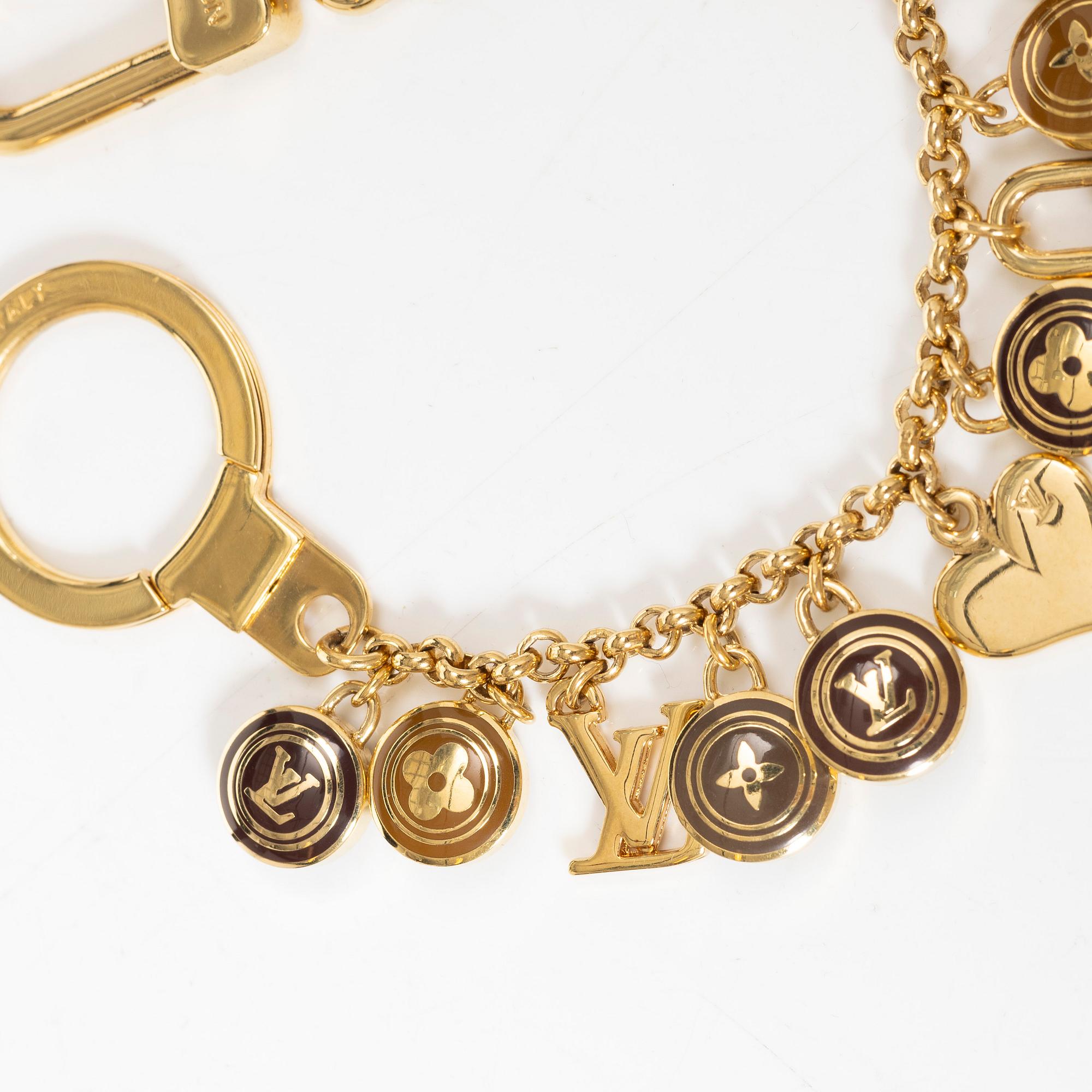 Louis Vuitton, Laukkukoriste/rannekoru, "Monogram Porte Cles".