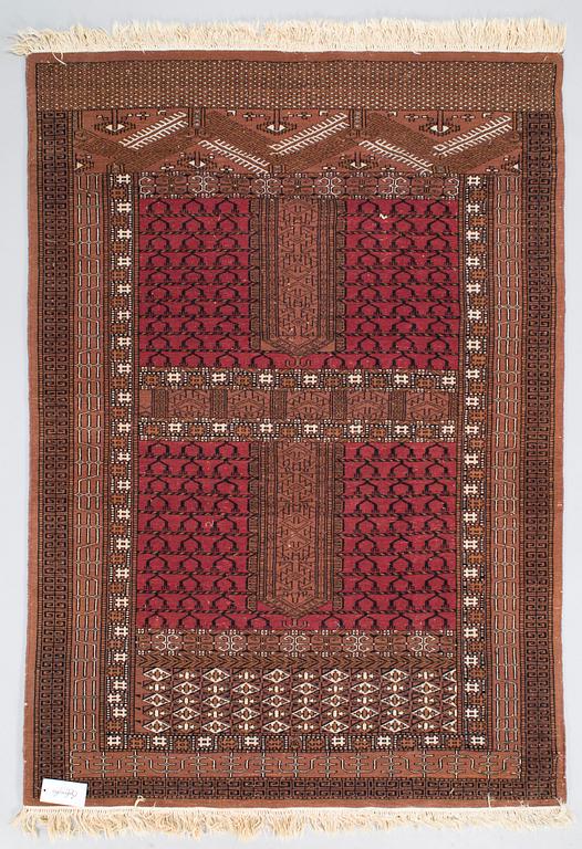 An Afghan rug, circa 180 x 127 cm.