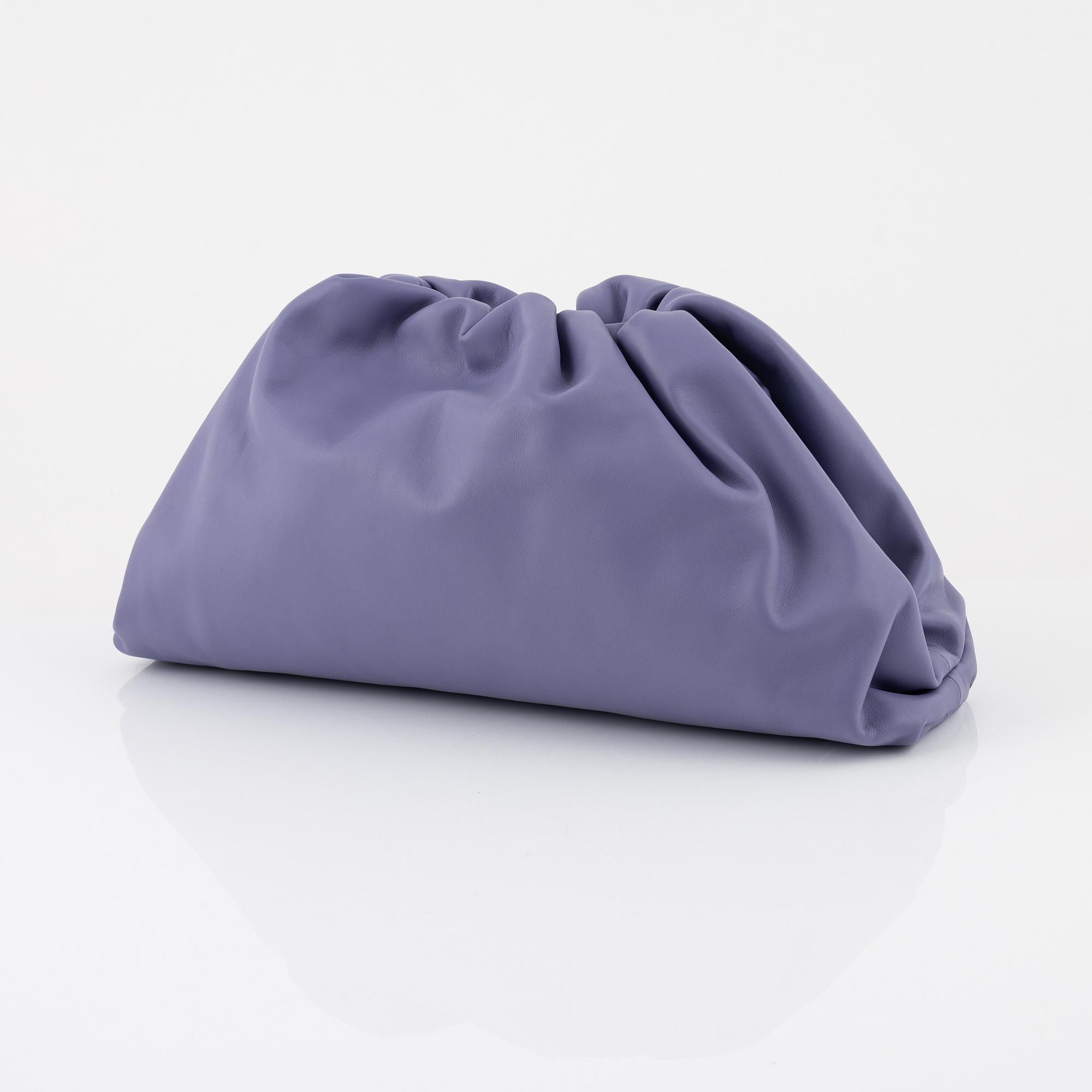 Bottega Veneta, a lavender leather 'Pouch clutch'.