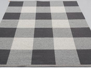 A mashine woven carpet, "Checkerboard", designed by Gunilla Lagerhem-Ullberg, Kasthall, around 246 x 163 cm.