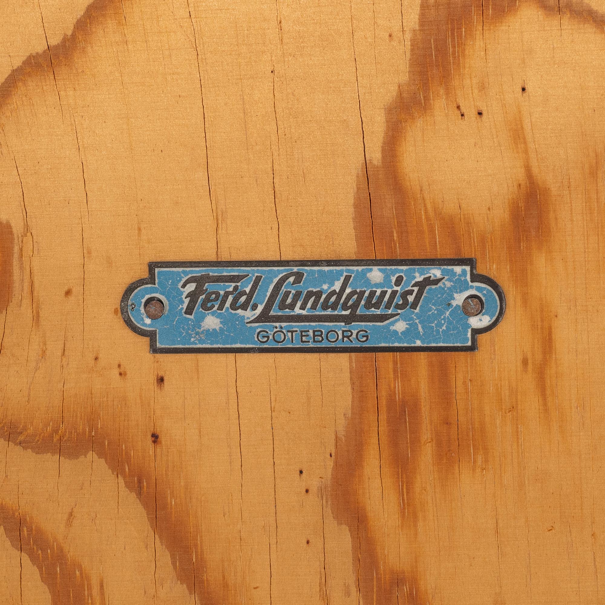 An elmwood serving trolley, Ferdinand Lundqvist, Gothenburg, 1940's/50's.