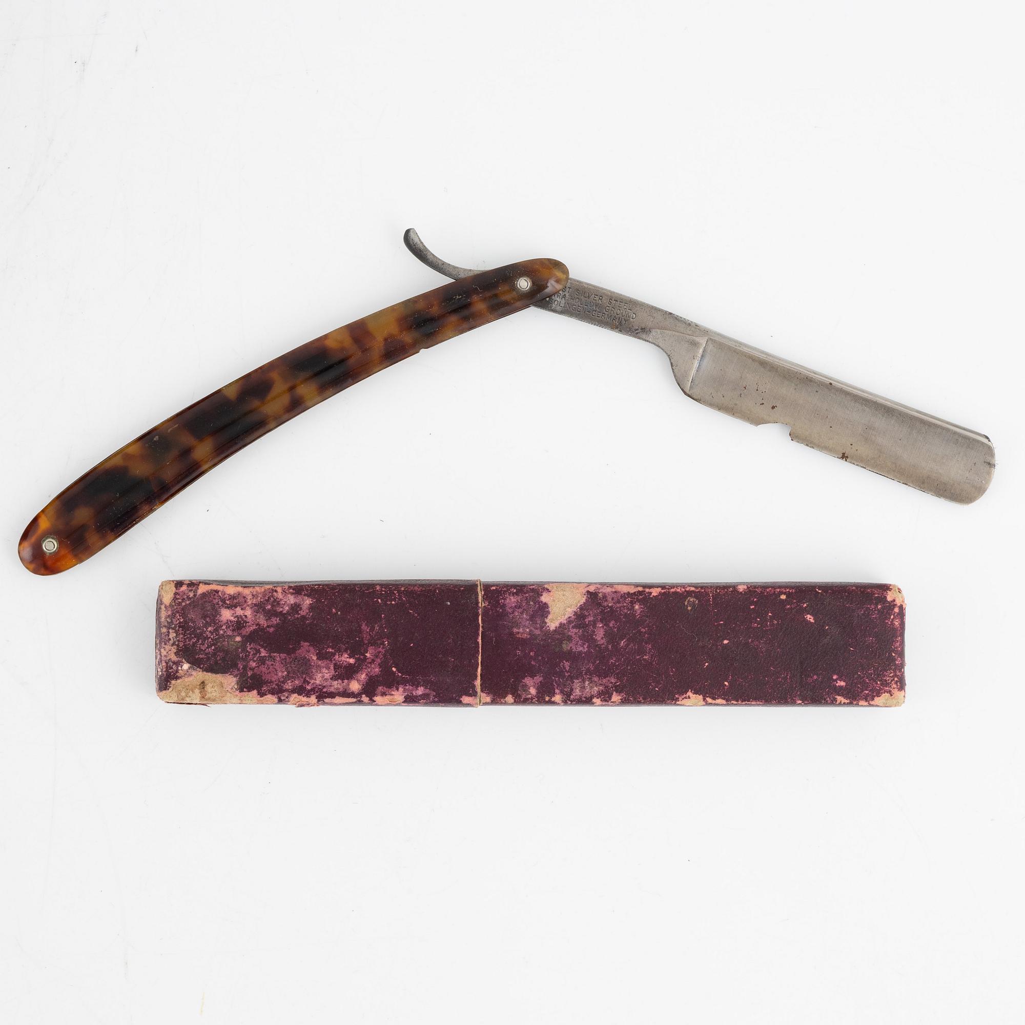An early 19th century mahogny-veneered box for shaving utensils.