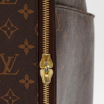 Louis Vuitton, a 'Pégase 65' suitcase.