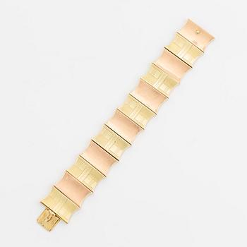 A 14K gold bracelet.