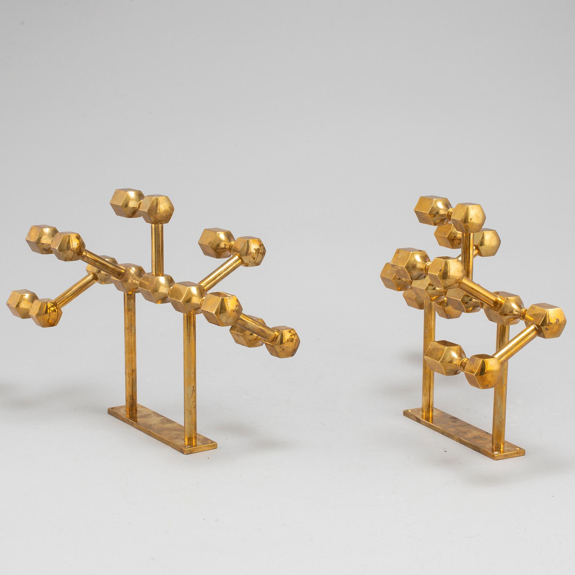 A pair of brass wall candelabras, for Gusum, signed BK and dated 1995 and 1997.