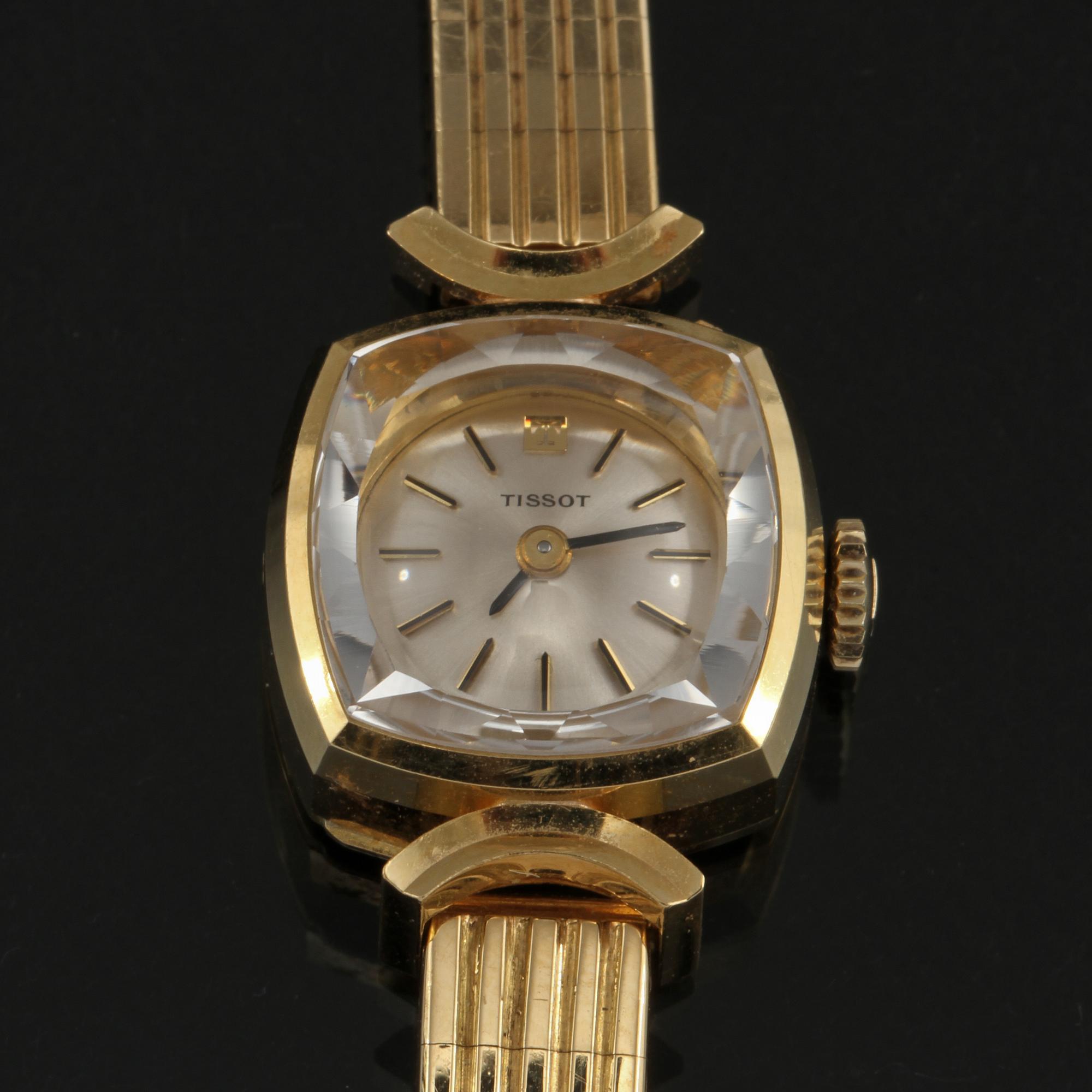 DAMARMBANDSUR, 18k guld, Tissot. Vikt 27 g.