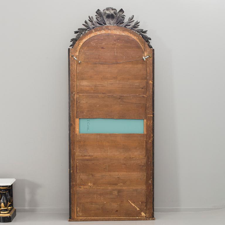 A 19th century mirror with wall table.