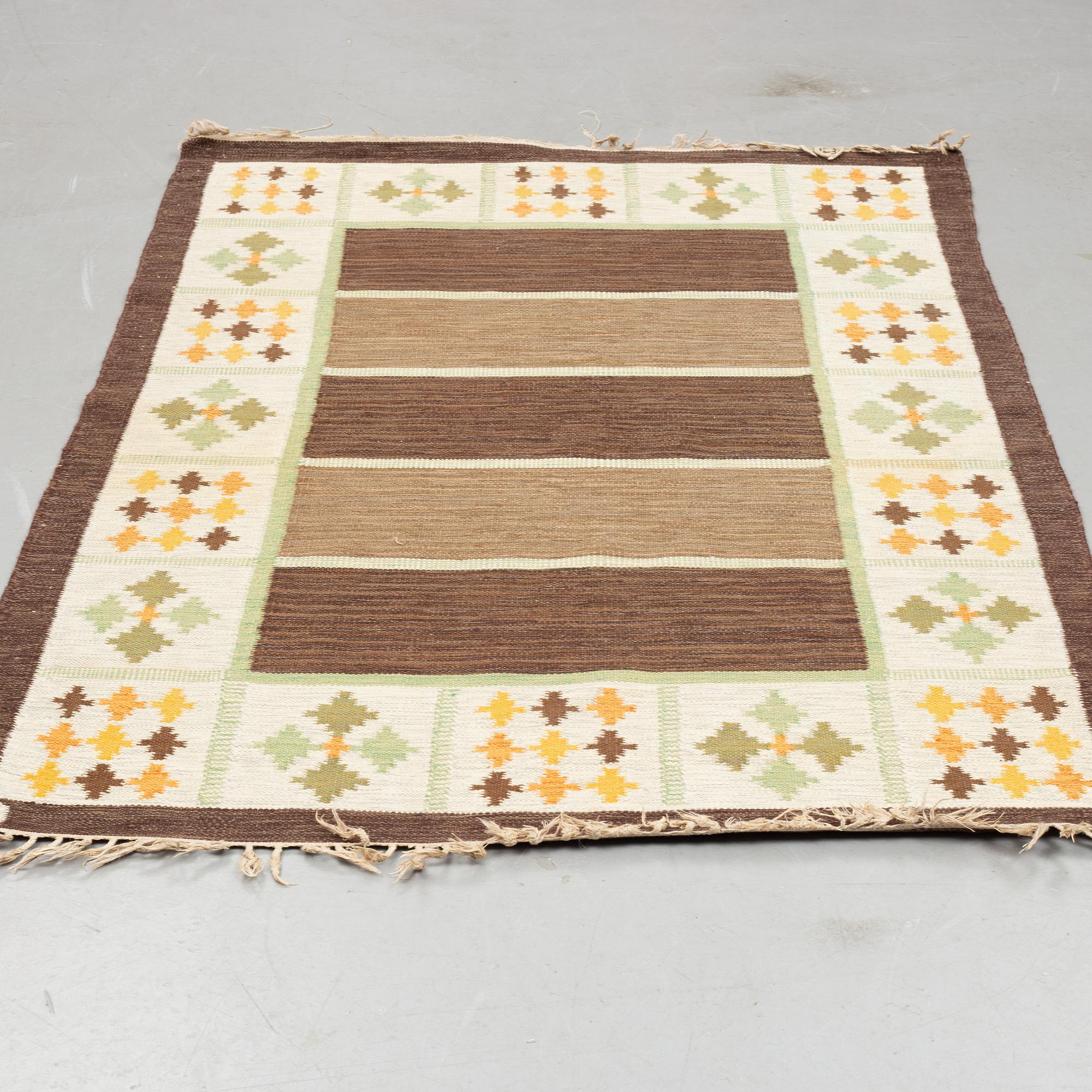A carpet, flat weave, ca 199 x 135-137,5 cm, signed W.