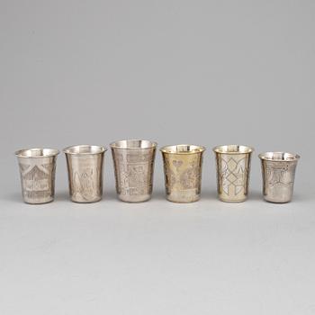 A set of six Russian 19th century parcel-gilt silver vodka cups.