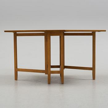 A mid 20th century flap table.