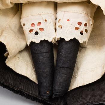 a HEUBACH KÖPPELSDORF porcelain doll, Germany in the first half of the 20th century.