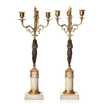 109. A pair of late Gustavian circa 1800 three-light candelabra.