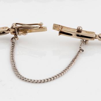 Armband 18K guld och vitguld med gammal- och åttkantslipade diamanter av CG Hallberg.