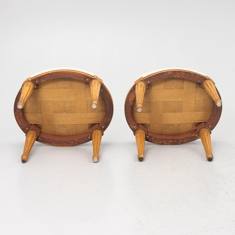 A pair of Louis XVI-style stools, late 19th century.