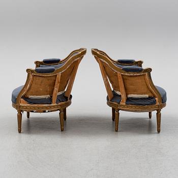 A pair of armchairs, Louis XVI-style, first half of the 20th century.