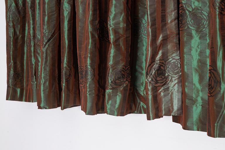 A set of four green silk curtains.