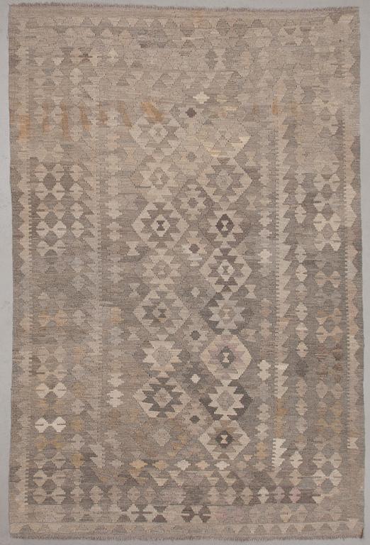 A kelim rug, ca 292 x 195 cm.