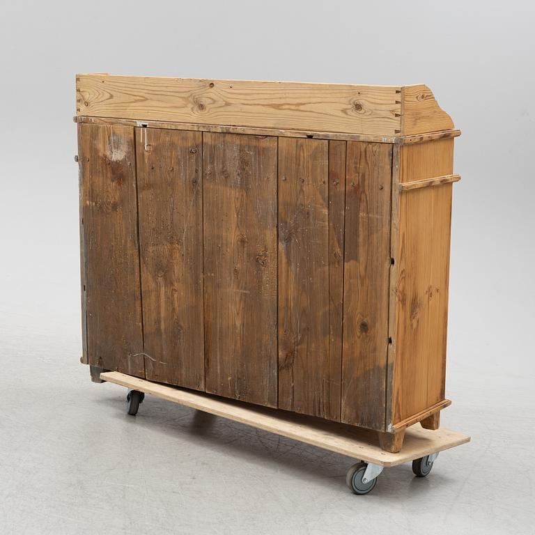 A 18th/19th Century pine cupboard.