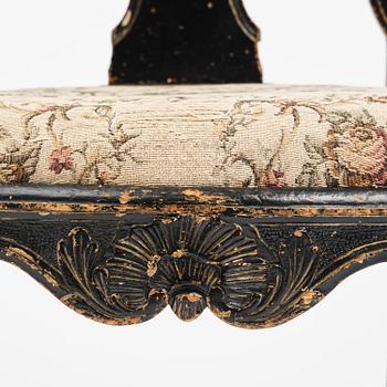 A pair of rococo armchairs in the manner of C. M. Sandberg, later part 18th century.