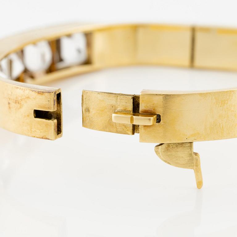 Wiwen Nilsson, a bracelet, 18K gold with step-cut rock crystal, Lund 1947.