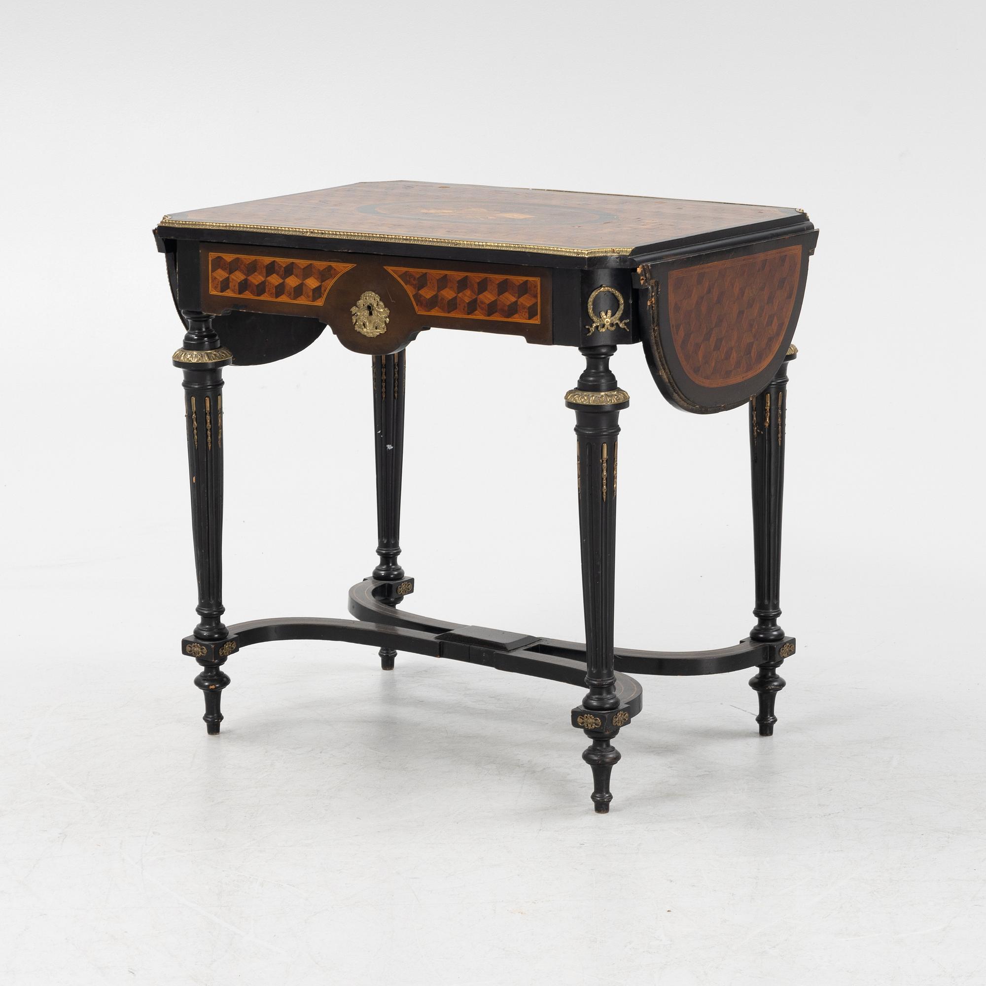 A Louis XVI style table, second half of the 19th century.