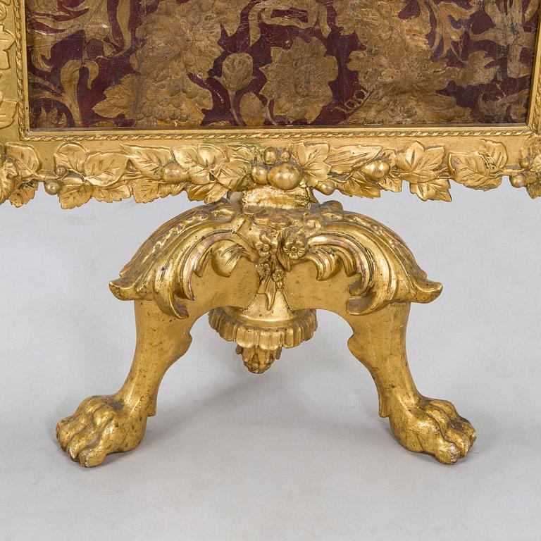 A Baroque style/Rococo revival brass protection, late 19th century.