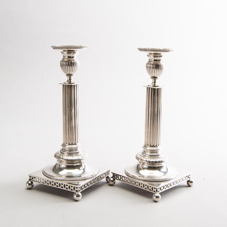 GUSTAF MÖLLENBORG, a pair of silver candlesticks 1902-1903 Stockholm.