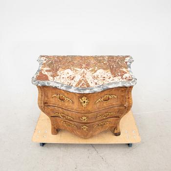 A mid 1700s Rococo dresser.