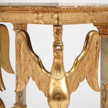 A Swedish Empire gilt wood and white marbel console table.