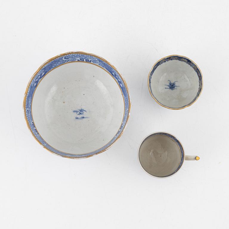Two Chinese blue and white cups with saucers, a bowl and a dish, Qing dynasty, Jiaqing (1796-1820).