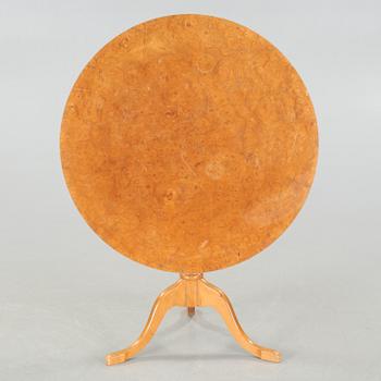 A folding table, made in the first half of the 20th century.