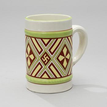 A MUG. Fennia series. The designers Jac. Ahrenberg och Thure Öberg.