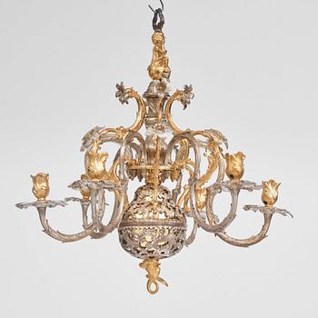 Carl Edberg's Masterpiece, a Swedish rococo silvered and gilt-brass six-light chandelier, circa 1755.