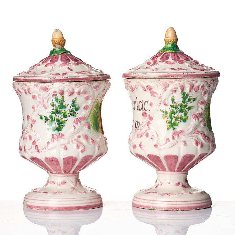 A pair of faiance historismus pharmacy jars with covers, 19th century.