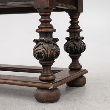 A 19th century Baroque style stone-top table.