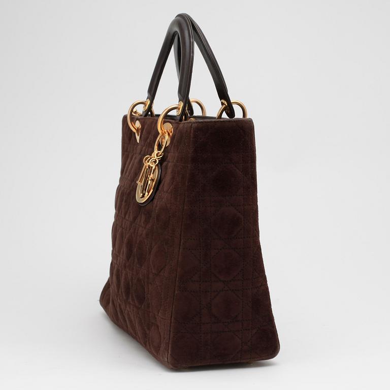 CHRISTIAN DIOR, a brown suede handbag.
